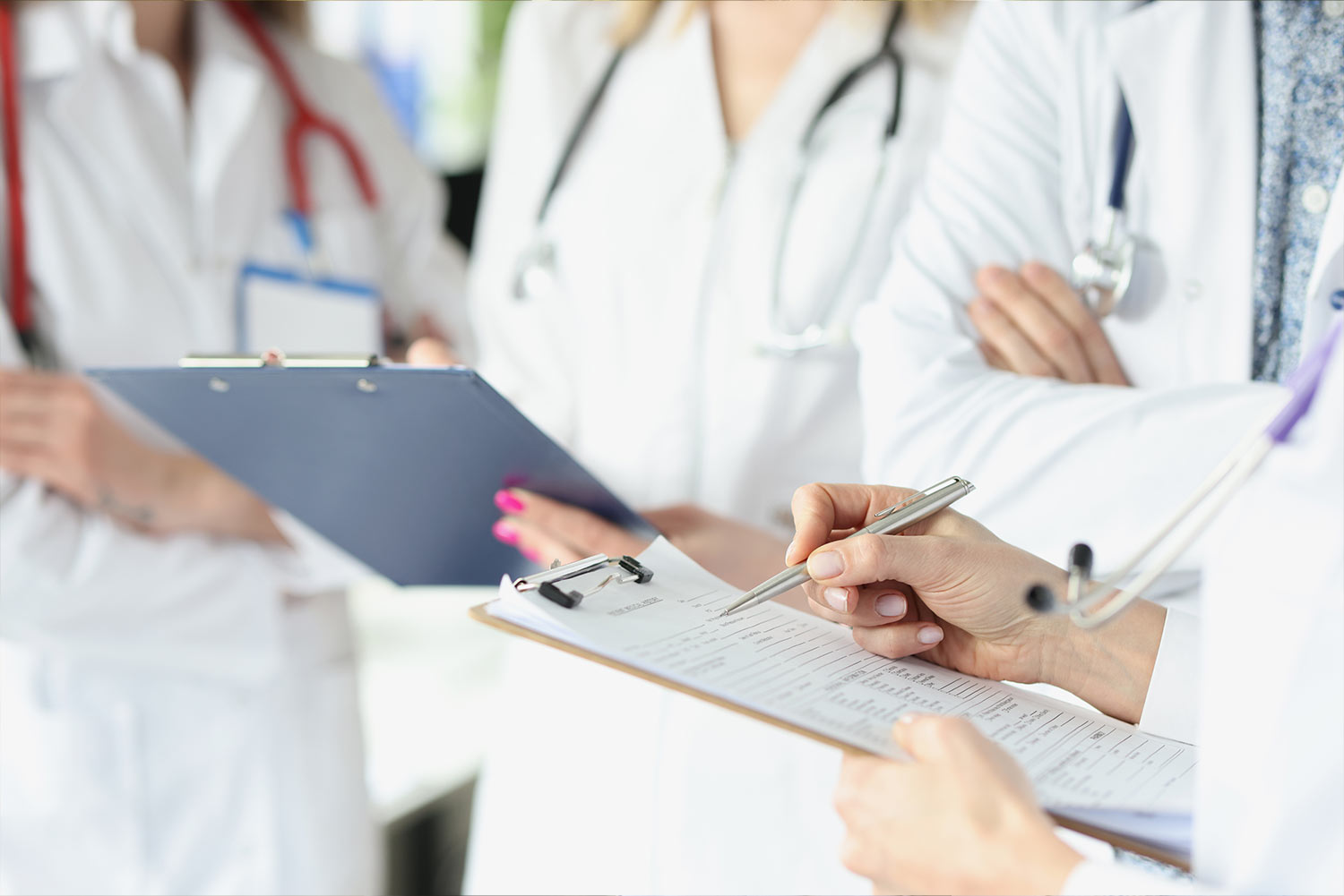 A clinician reviewing patient information